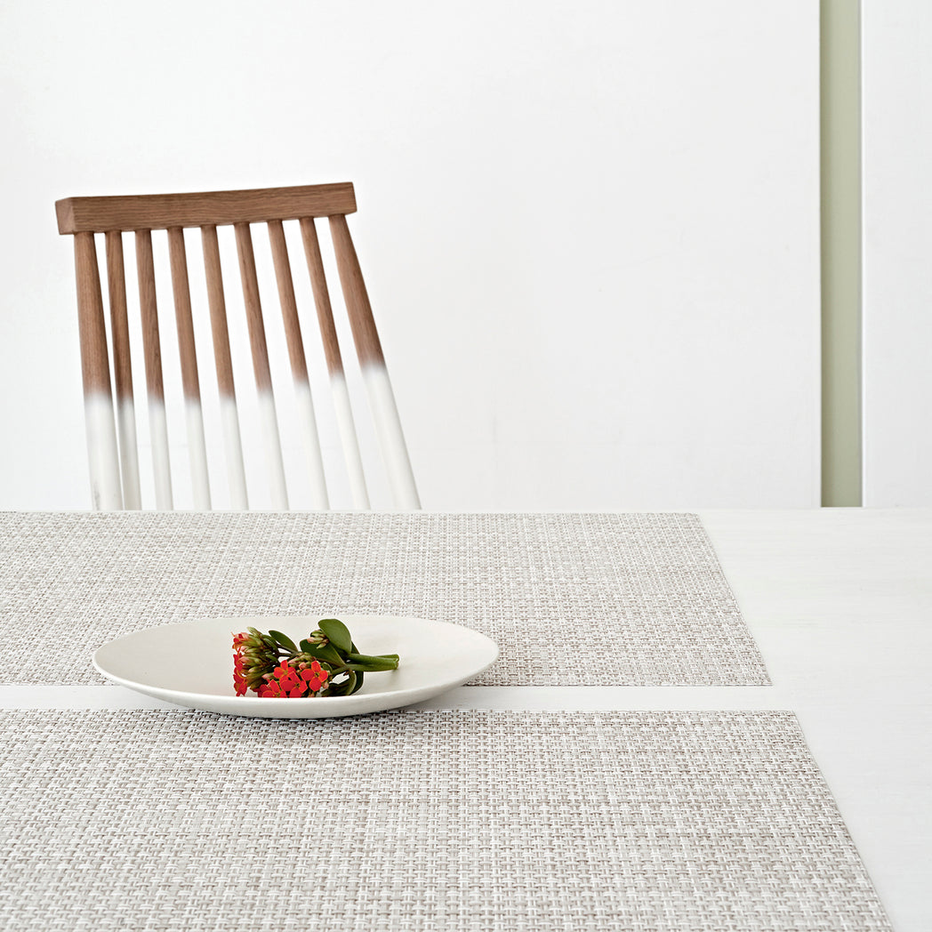 Chilewich Basketweave floor mat in natural, showcasing woven terrastrand yarn texture and modern design aesthetic.