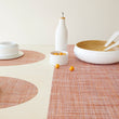 Chilewich Basketweave floor mat in cinnamon, showcasing woven terrastrand yarn texture and modern design aesthetic.