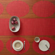 Chilewich Basketweave floor mat in scarlet, showcasing woven terrastrand yarn texture and modern design aesthetic.
