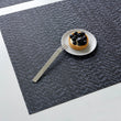 Detail image of Chilewich woven material showcasing texture, color, and pattern of the terrastrand yarn weave.