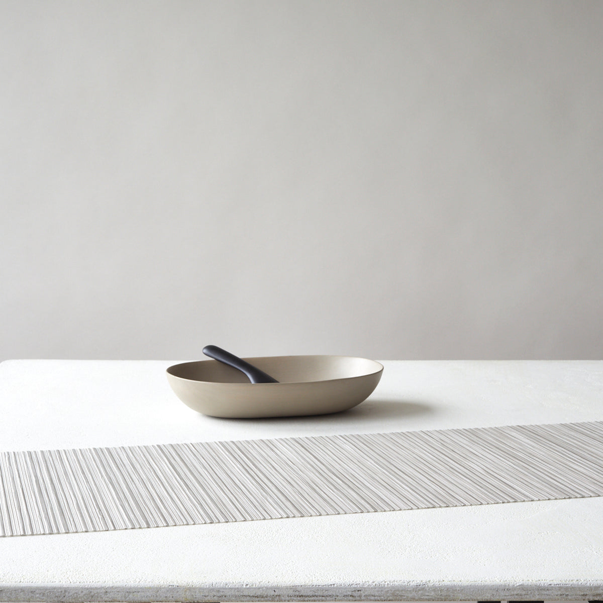Detail image of Chilewich woven material showcasing texture, color, and pattern of the terrastrand yarn weave.