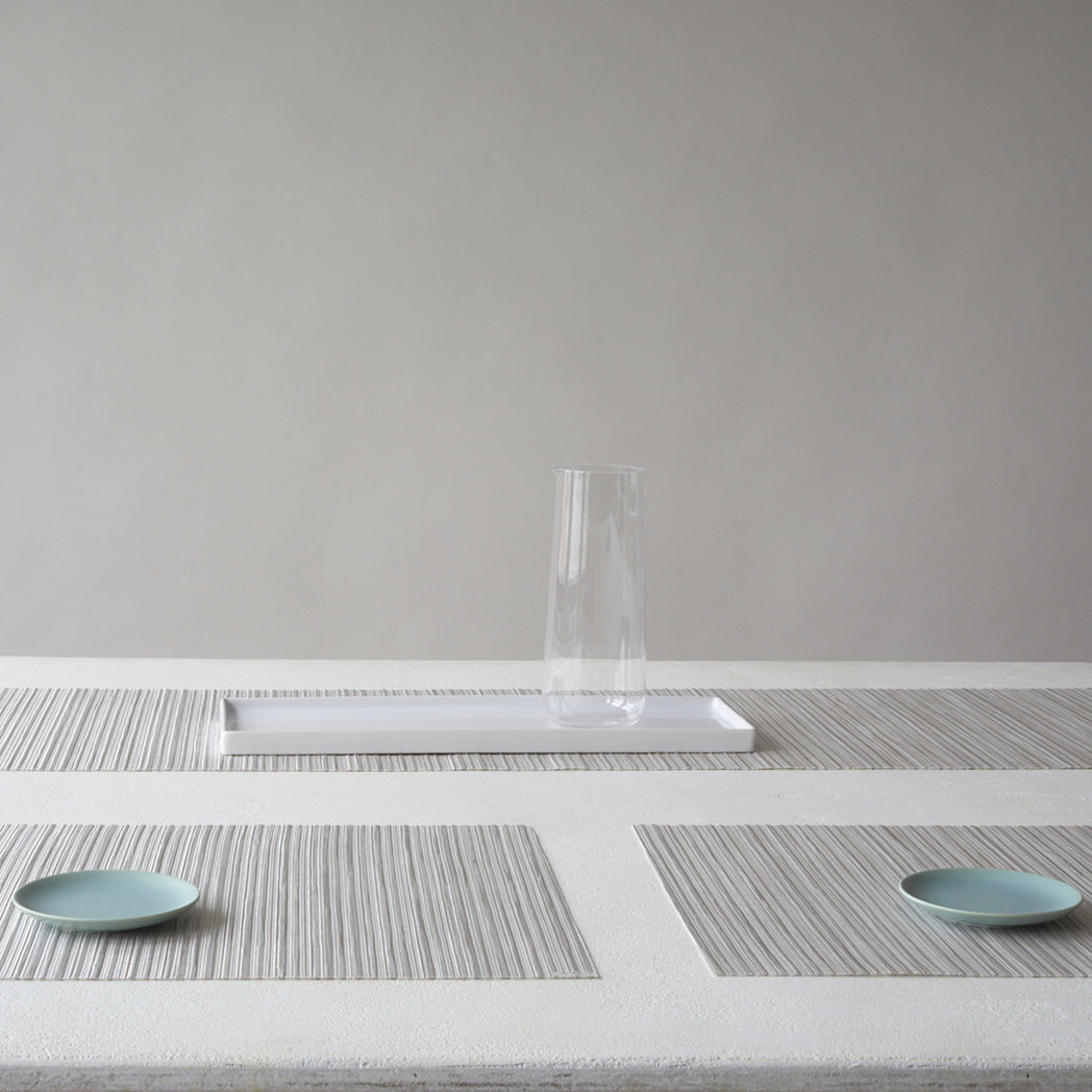 Detail image of Chilewich woven material showcasing texture, color, and pattern of the terrastrand yarn weave.