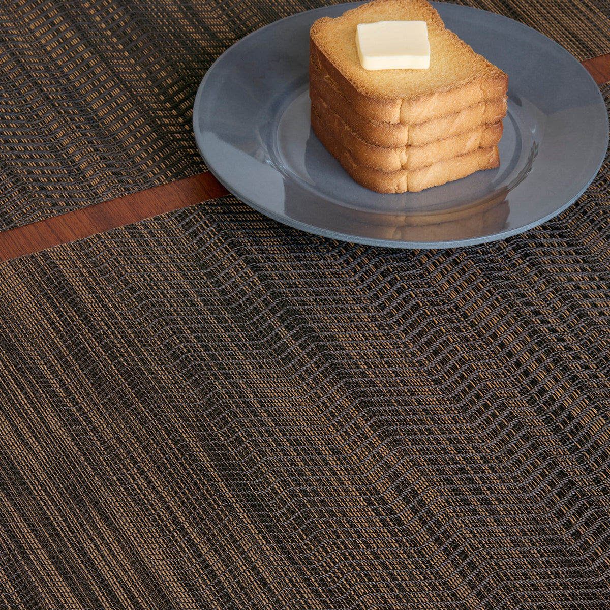 Detail image of Chilewich woven material showcasing texture, color, and pattern of the terrastrand yarn weave.